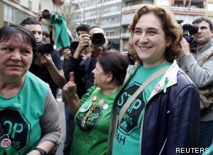 File photo of Ada Colau, spokesperson for the Mortgage Victims' Platform, smiles during a rally in Barcelona